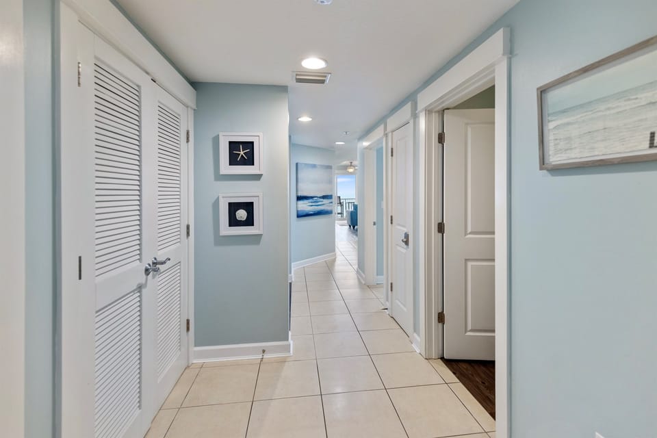 Step into your coastal retreat with soothing aqua walls and nautical touches that instantly transport you to seaside bliss.