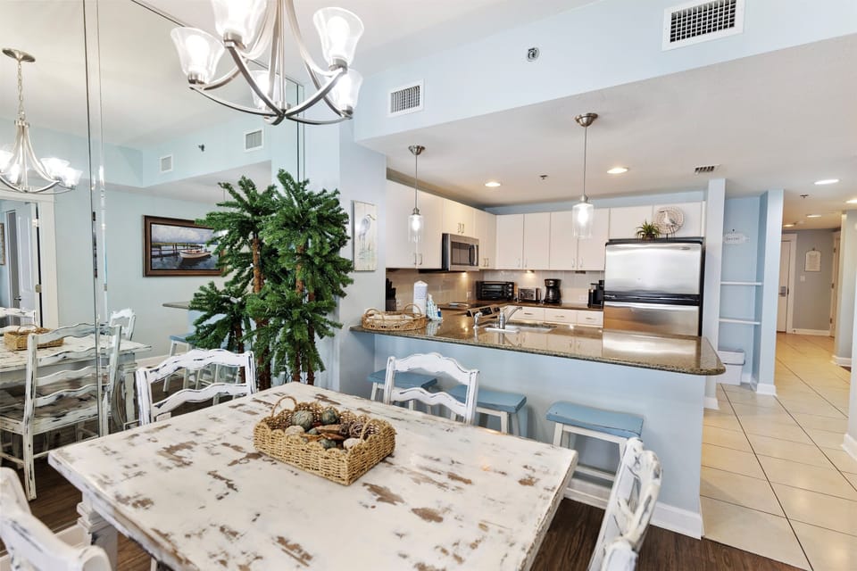 Your open-concept kitchen flows seamlessly into the dining space, creating the perfect setting for memorable meals together.