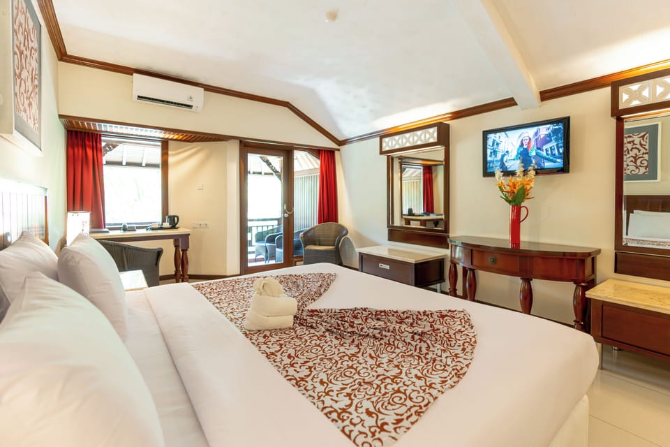 Deluxe Room (Special 20% OFF on Waterbom Bali) | Premium bedding, in-room safe, desk, iron/ironing board