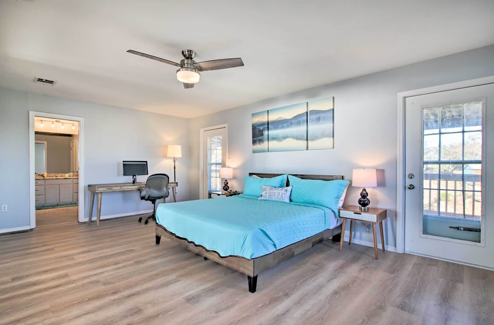 Bedroom 1 | California King Bed | Linens & Towels | Balcony Access | WFH Desk