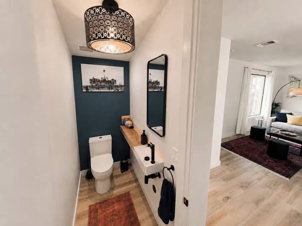 A powder room is located on the ground floor