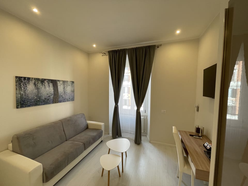 Junior Suite | Down comforters, in-room safe, individually decorated