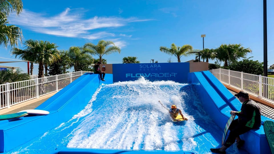 Catch waves at the FlowRider in Solara Resort, perfect for thrill-seekers.