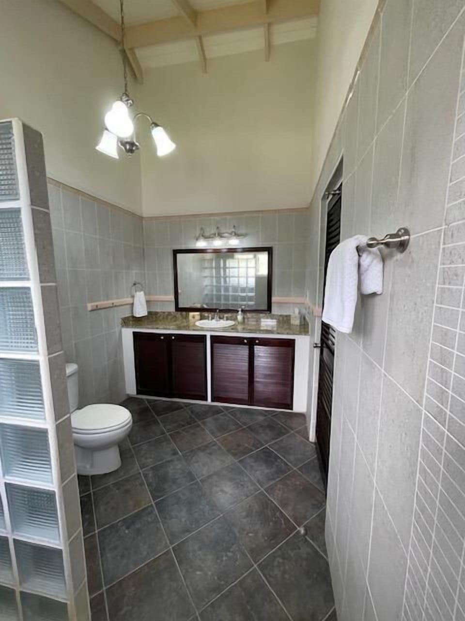 Bathroom 2 has a toilet and shower.