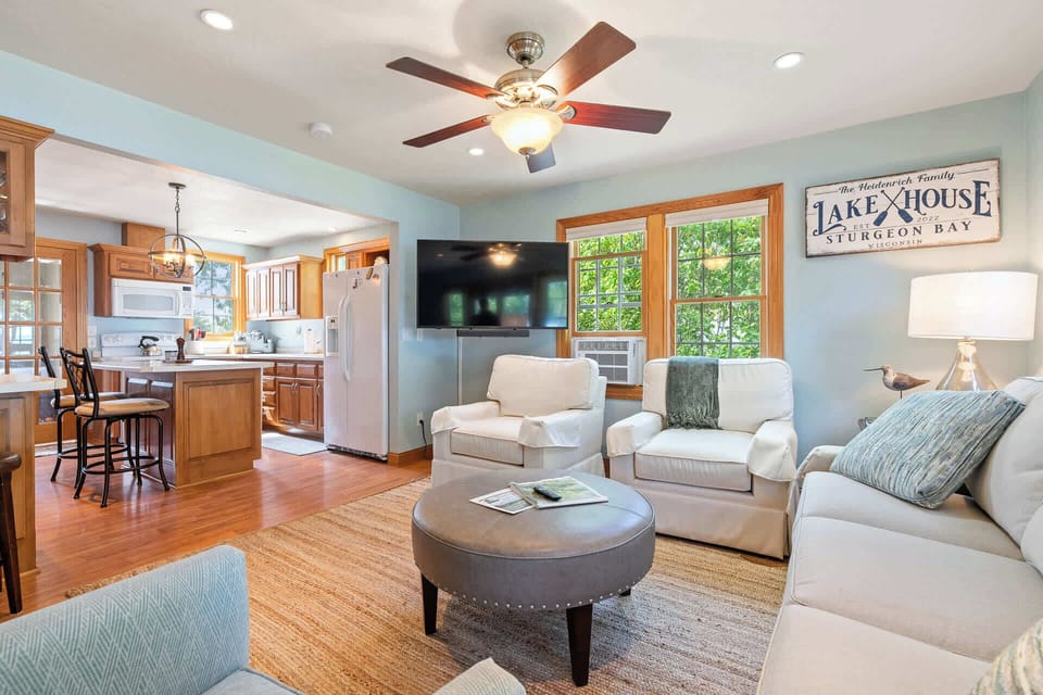 Modern, comfortable seating, includes a Smart TV and window AC unit