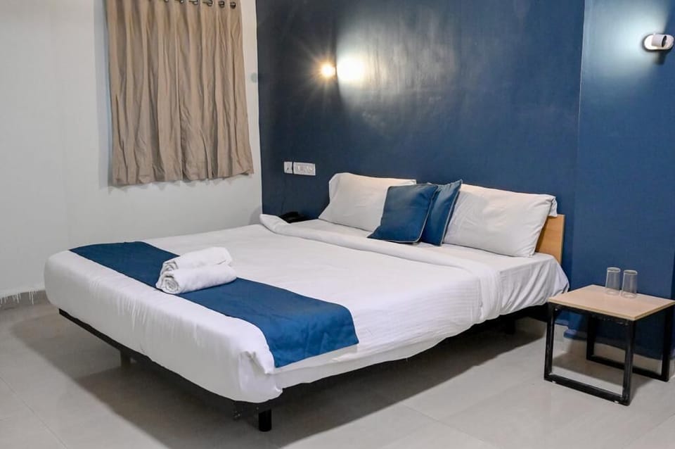 Desk, laptop workspace, free WiFi, bed sheets