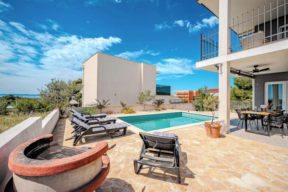 Outdoor pool, sun loungers