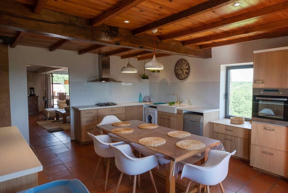 Fully equipped kitchen - Dishwasher - Delonghi coffee machine - Kettle - Raclette and fondue machine - Mixer - Dining table with extensions for 12 people - Washing machine.