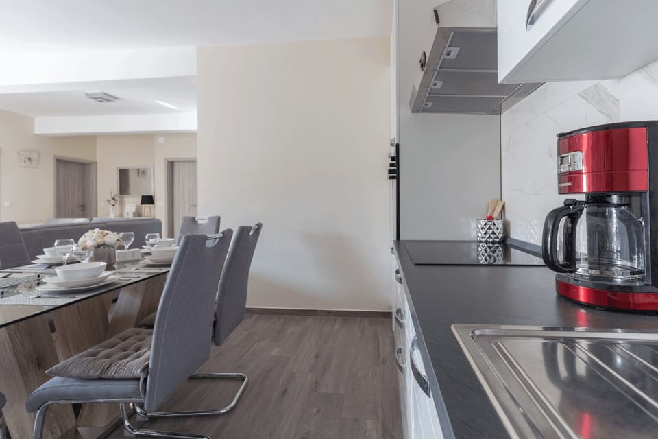 Family Villa | Private kitchen | Fridge, microwave, oven, stovetop