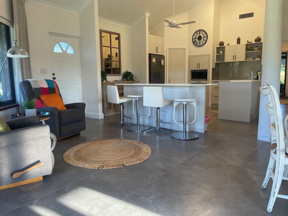Kitchen island bench for breakfasts on the go and recliners for that PM nap