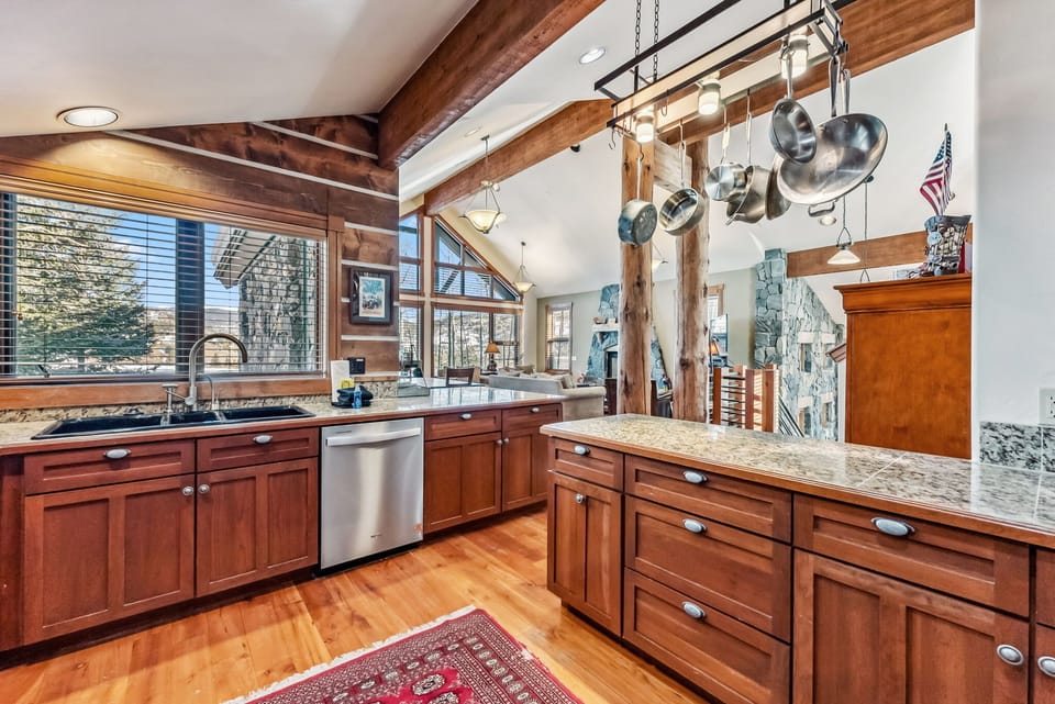 Kitchen: Drip coffee maker, Keurig coffee maker, wine fridge, blender, cooking utensils, tableware