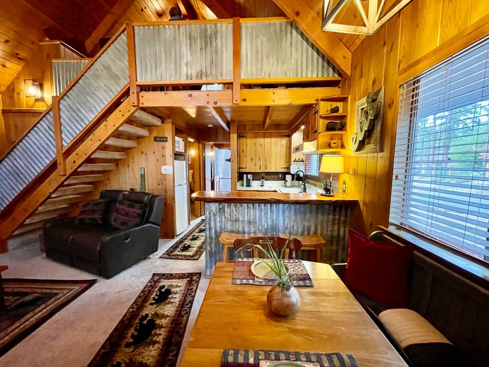 dining area adjacent to living room and kitchen comfortably seats 4