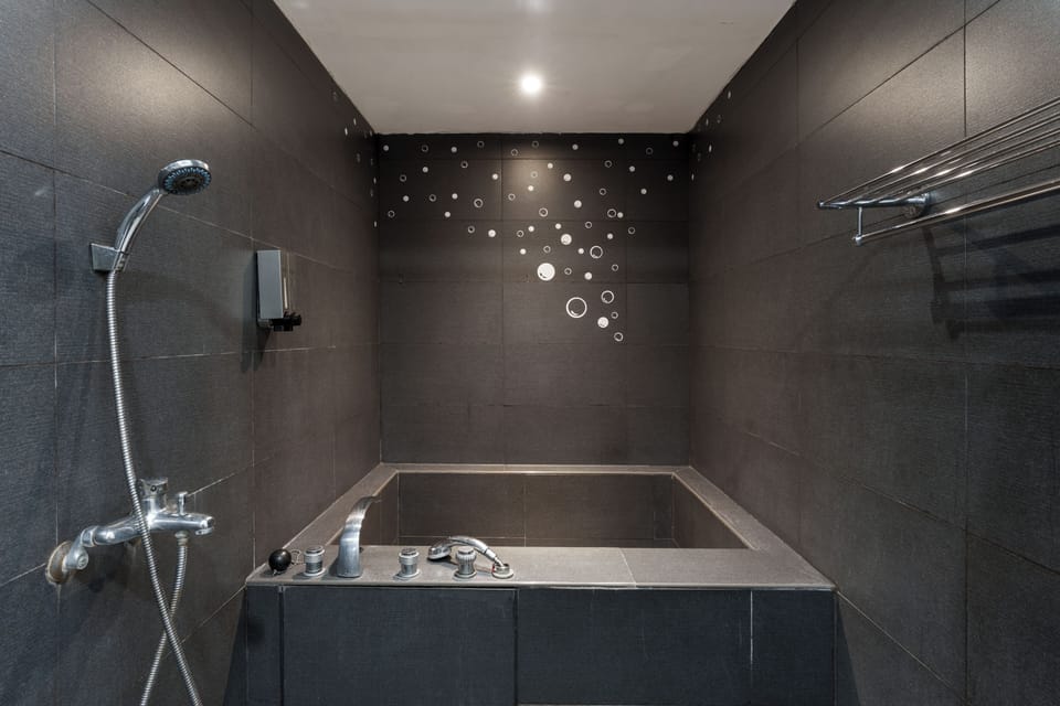 Family Room, Multiple Beds, Hot Tub | Bathroom | Shower, hair dryer, slippers, towels