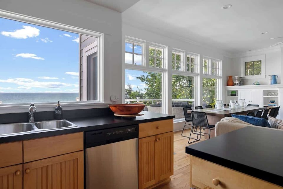 An open, sophisticated kitchen provides the ultimate workspace for any chef.