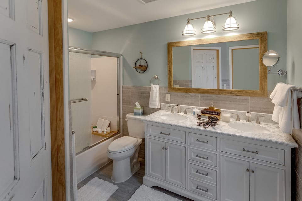 Shower and tub combination, hair dryer and make up mirror
