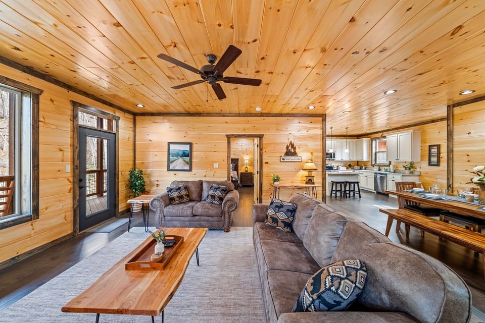 Main level: living room #1 w/ smart TV (Dish TV), an electric fireplace and a queen sleeper sofa.