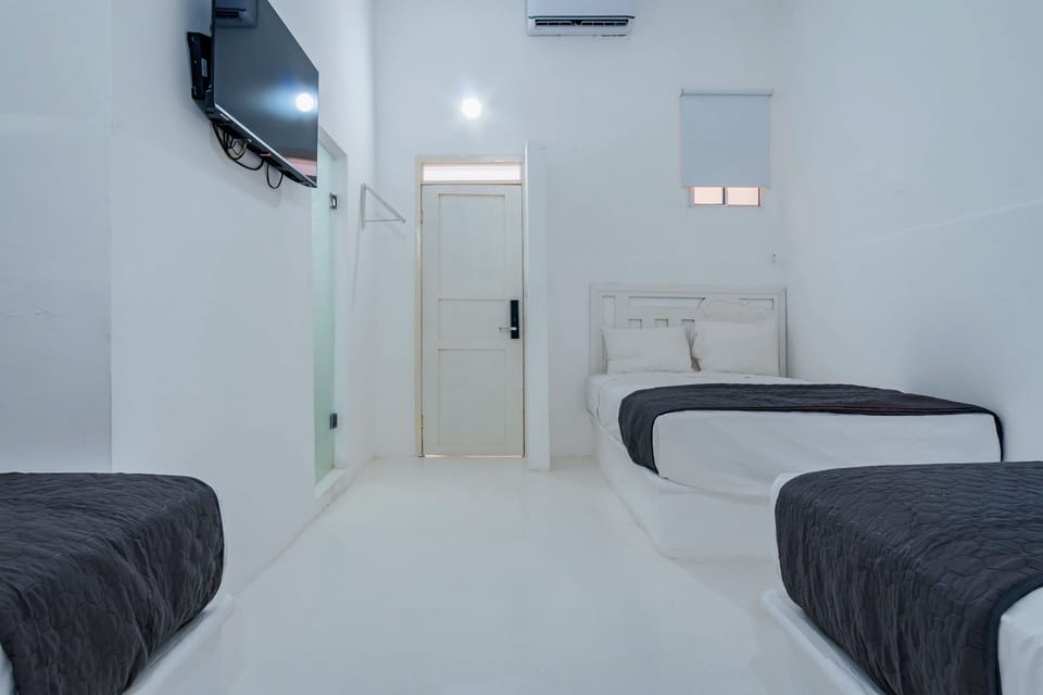 Triple Room | Egyptian cotton sheets, premium bedding, down comforters
