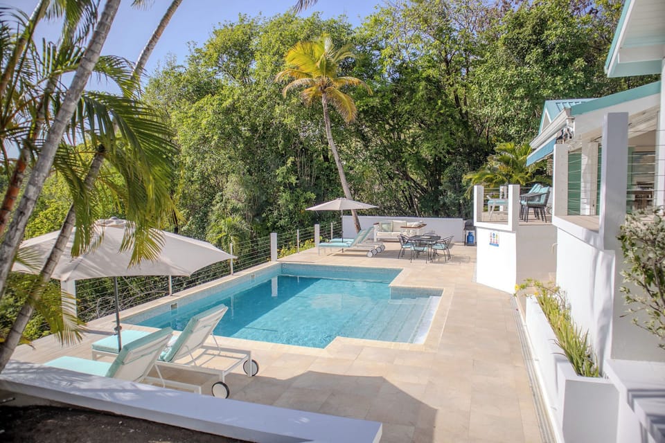 Lounge by the pool & take in the views