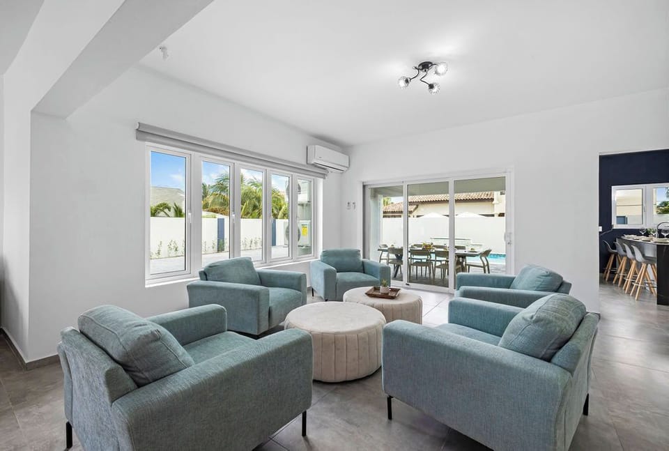 Clean and bright living room space with a cozy sofa.
