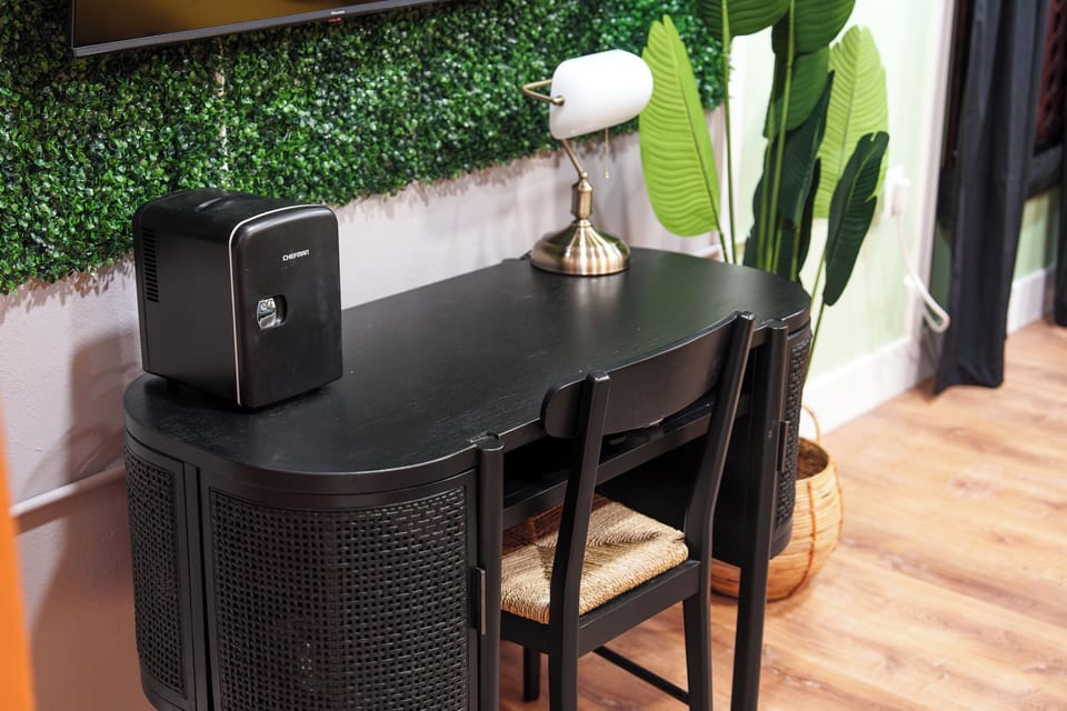 Enjoy the Game Room—workspace, Connect 4, arcades, smart TV, darts, & more!