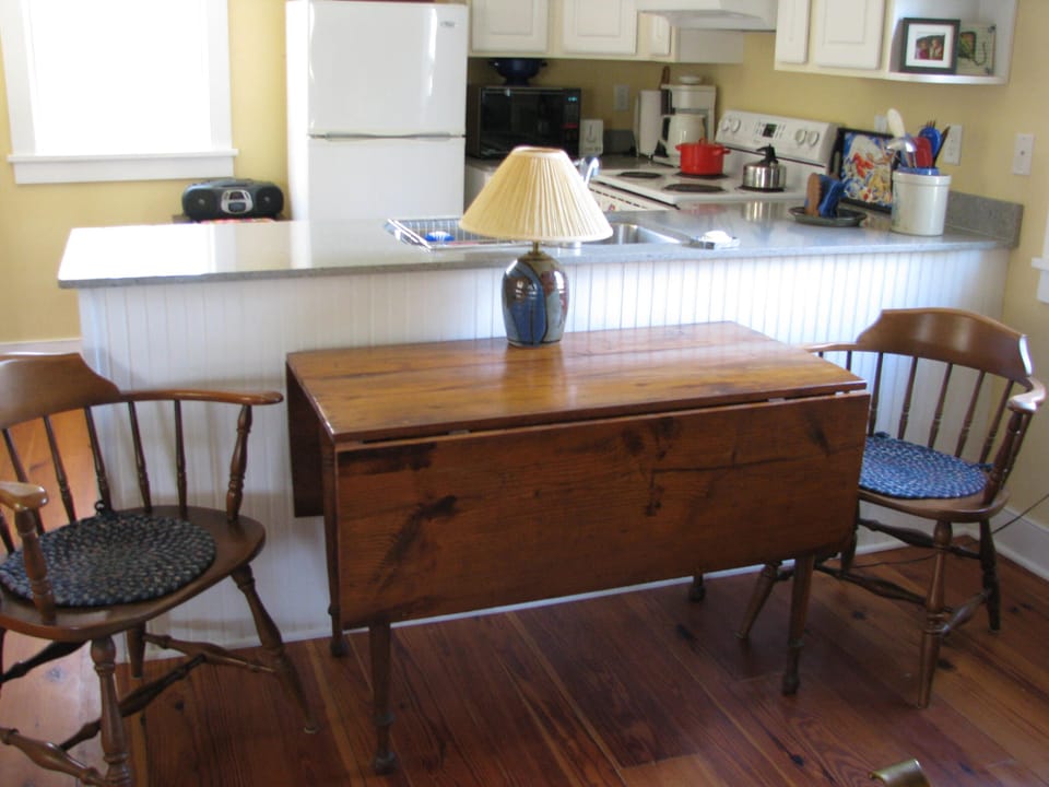 Antique drop leaf dining table