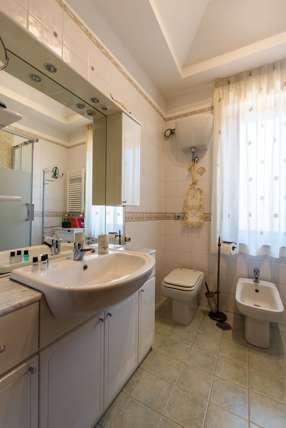 Hair dryer, bidet, towels, soap
