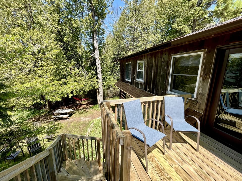 Deck off of master bedroom, overlooking the backyard.