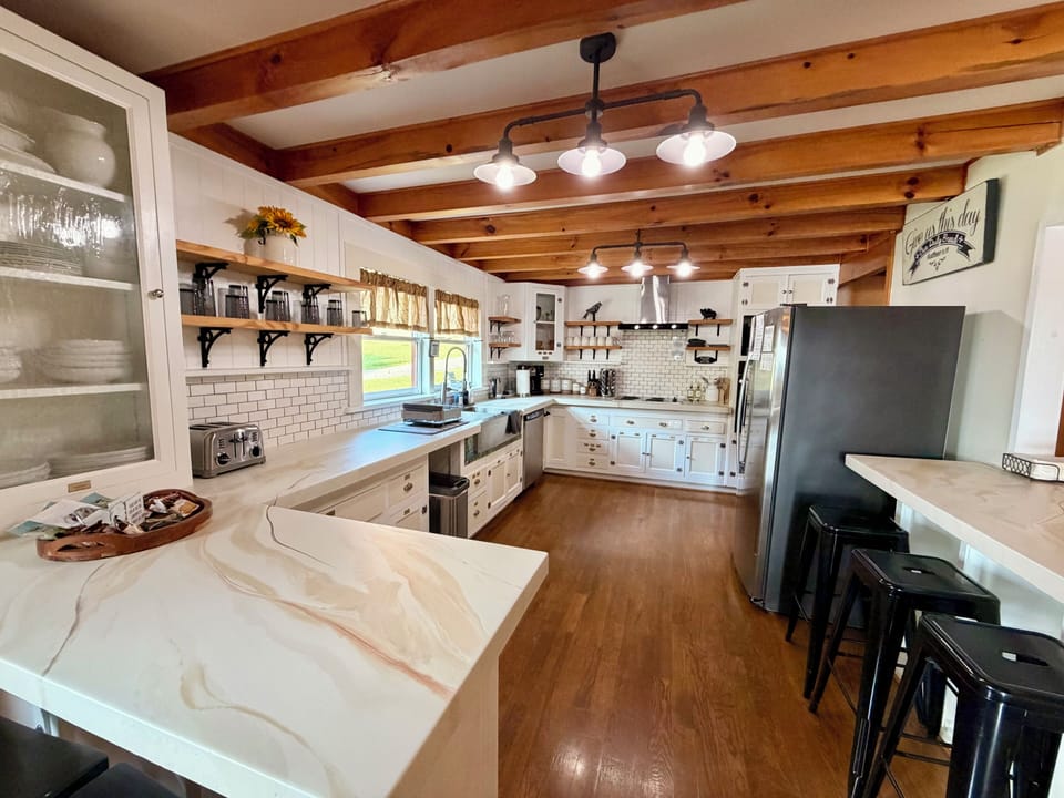 A spacious, well-equipped kitchen gives everyone room to cook, snack and gather—because somehow everyone always ends up in the kitchen