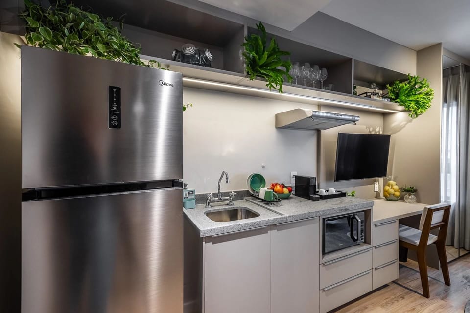 Premier Apartment | Private kitchen | Full-size fridge, microwave, stovetop, cookware/dishes/utensils