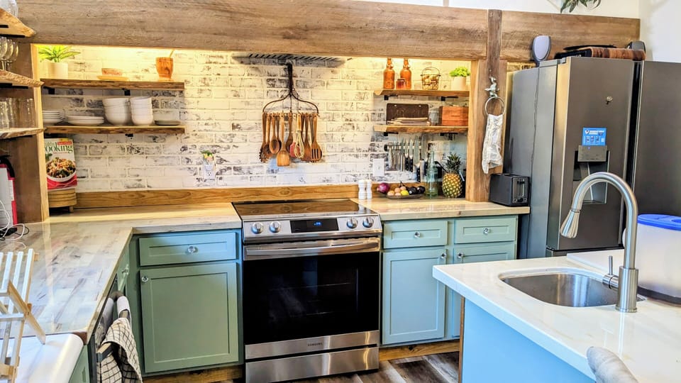 4 burner electric stove,  warming center with air fryer oven.