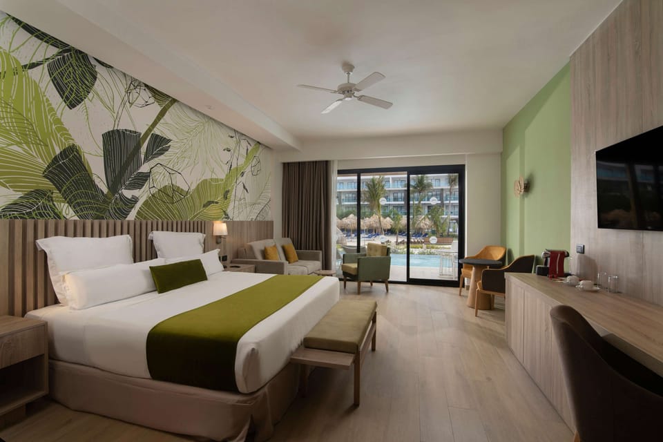 Junior Double Room, Pool Access, Garden View | Free minibar, in-room safe, desk, laptop workspace