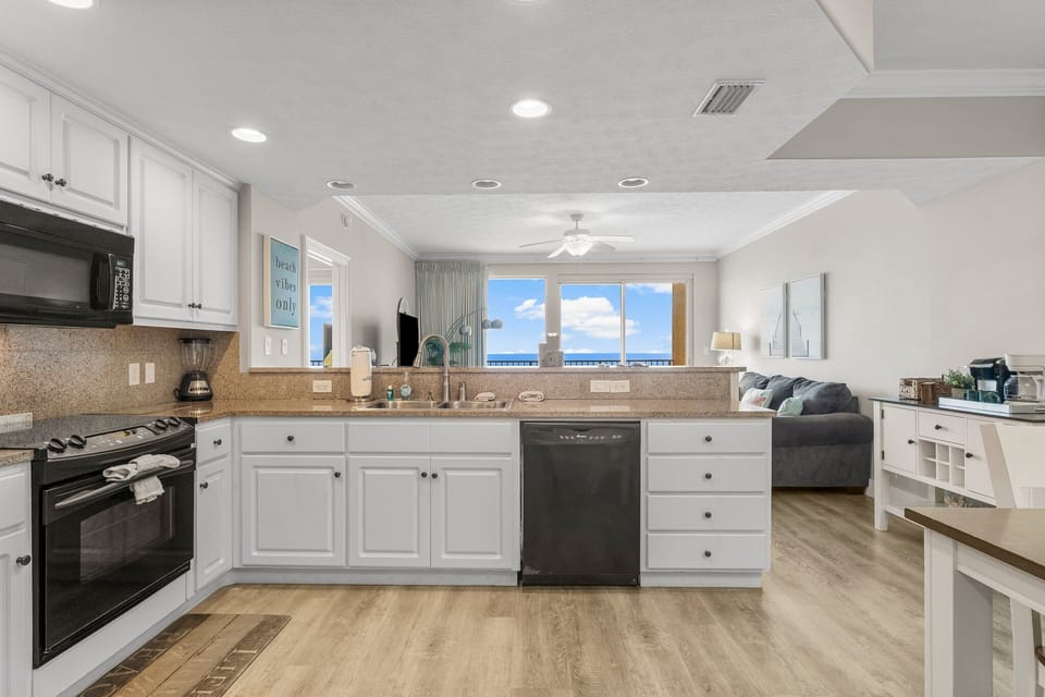 Modern kitchen with ocean views and open living space