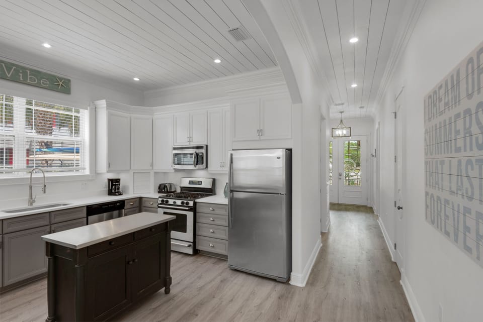 Brand new quartz counters and fully equipped for your culinary masterpieces.
