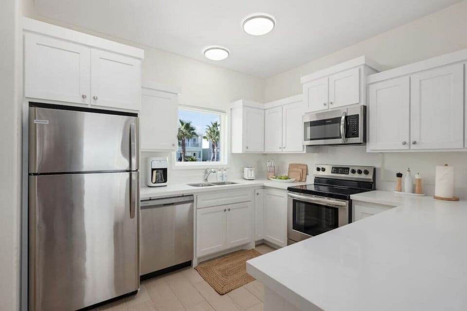 Upgrade your kitchen experience with a suite of handy amenities, from a time-saving dishwasher for swift cleanup to a full arsenal of cookware and dinnerware essentials.