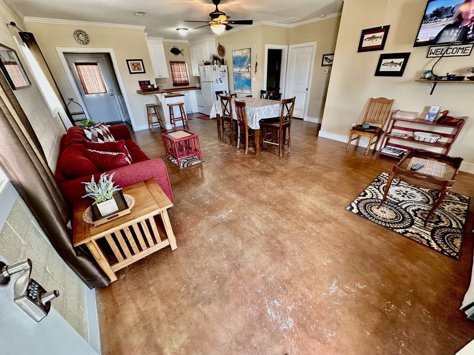 View of living dining and kitchen areas