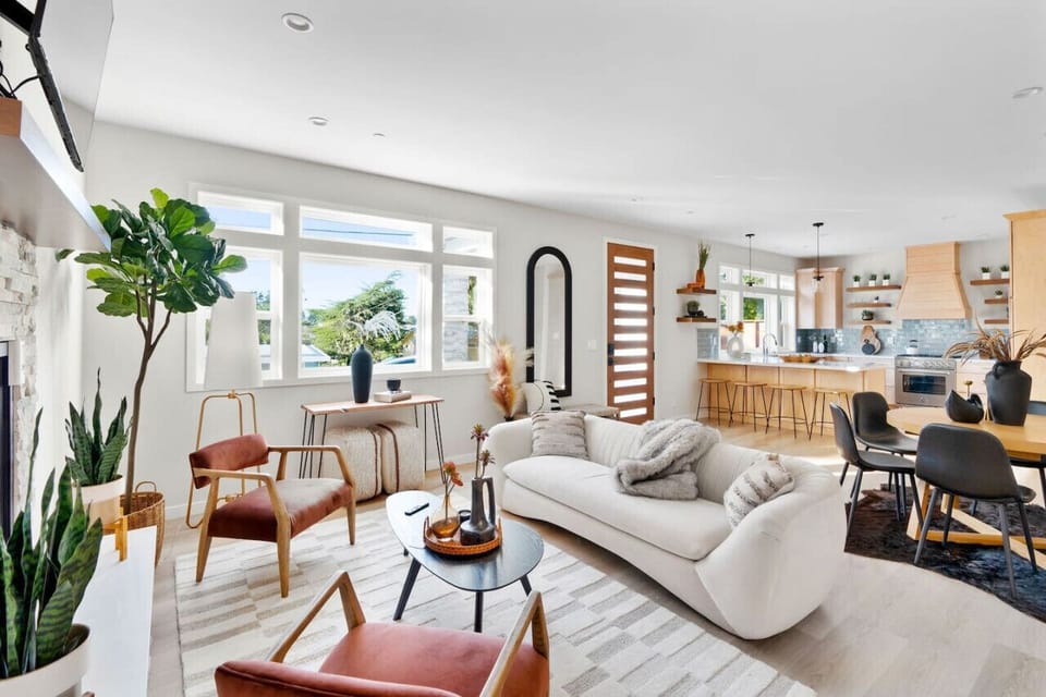 Living area on one side, kitchen on the other, this open-concept home is great for entertaining or just relaxing.