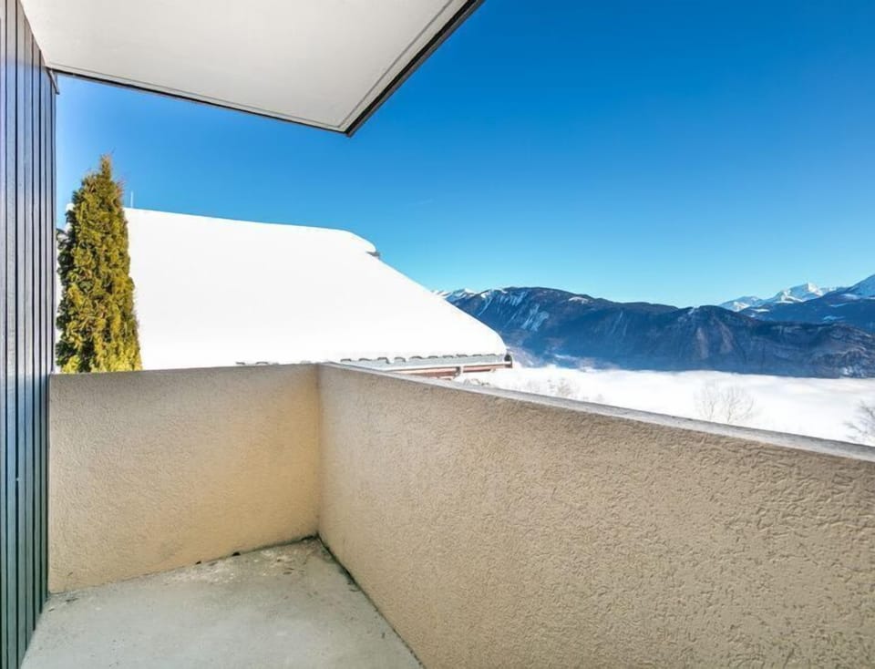 Step out onto your balcony and breathe the fresh air.