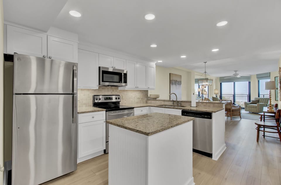 Kitchen with stainless steel appliances.