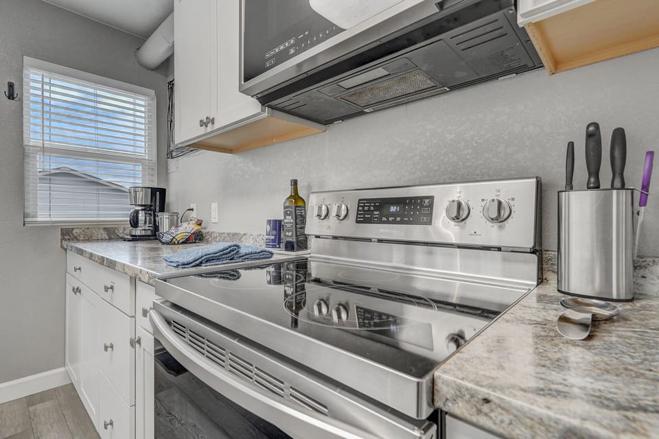 Gorgeous galley kitchen stocked with all your cooking needs!