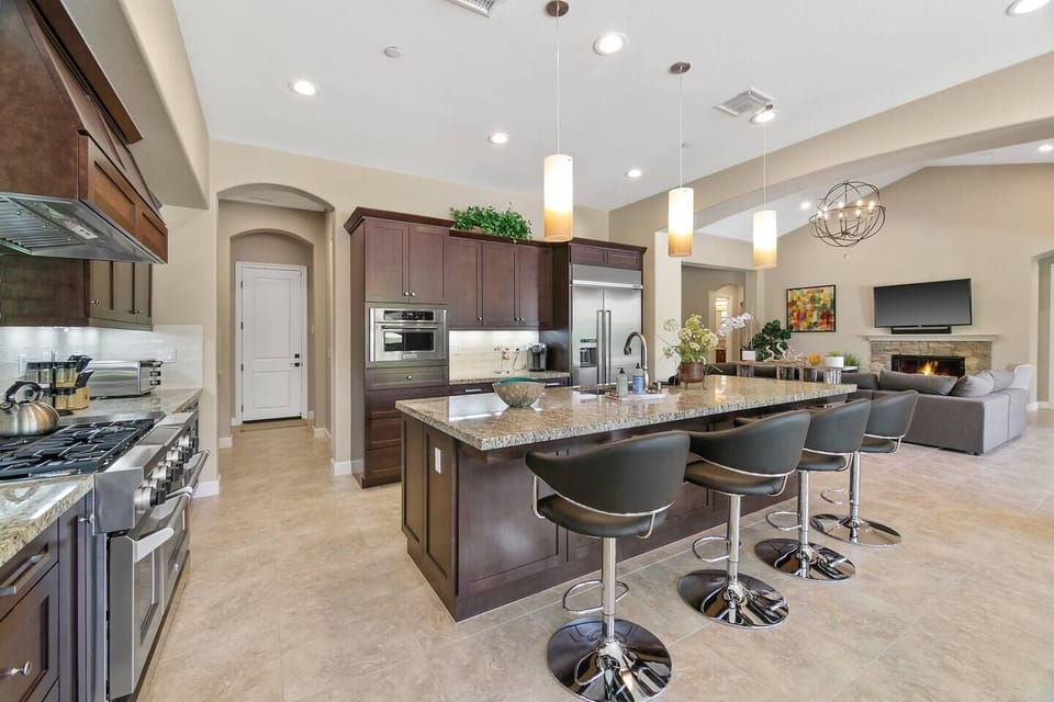 Modern kitchen with bar seating and open layout