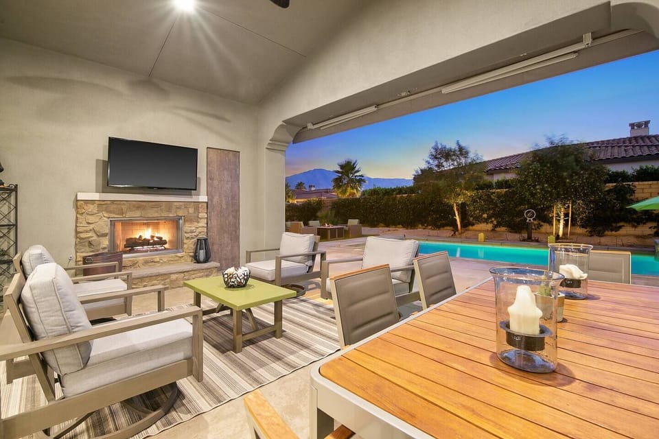 Covered patio with fireplace and seamless indoor-outdoor living