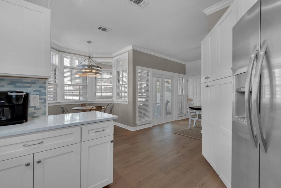 kitchen area with open access to the dining area