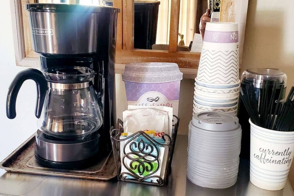 Coffee bar is set up for everything you need with drip or pods available