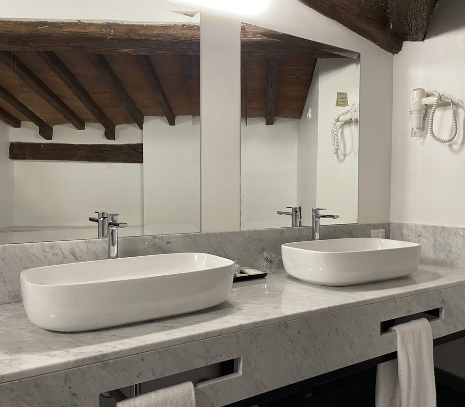 Suite, Jetted Tub (Palazzo Delle Poste) | Bathroom | Shower, hair dryer, bidet, towels