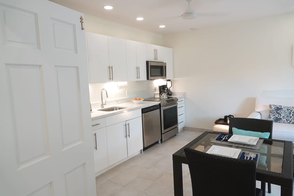 Fully-Equipped Kitchen with dining table