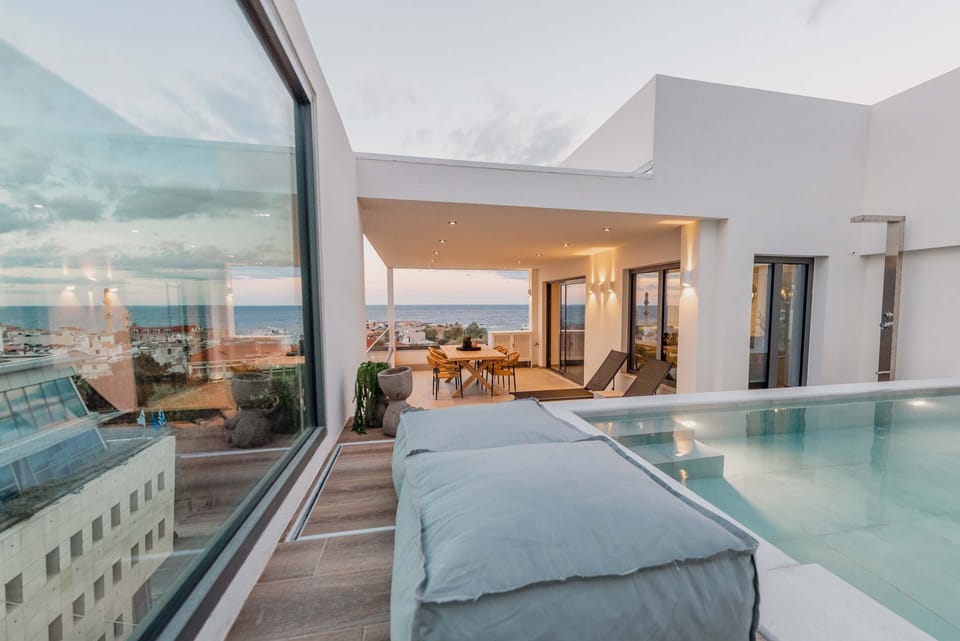 Outdoor pool, a heated pool, sun loungers