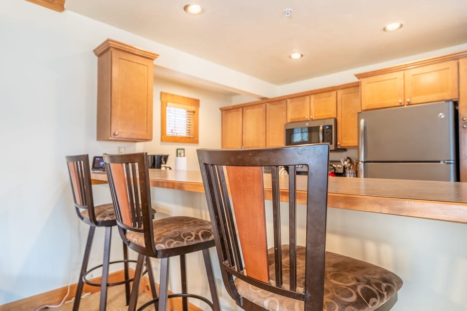 Breakfast bar with seating for three.