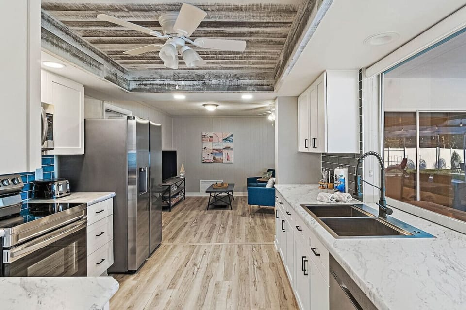Brand new chef’s kitchen, appliances, cabinets, and decor.