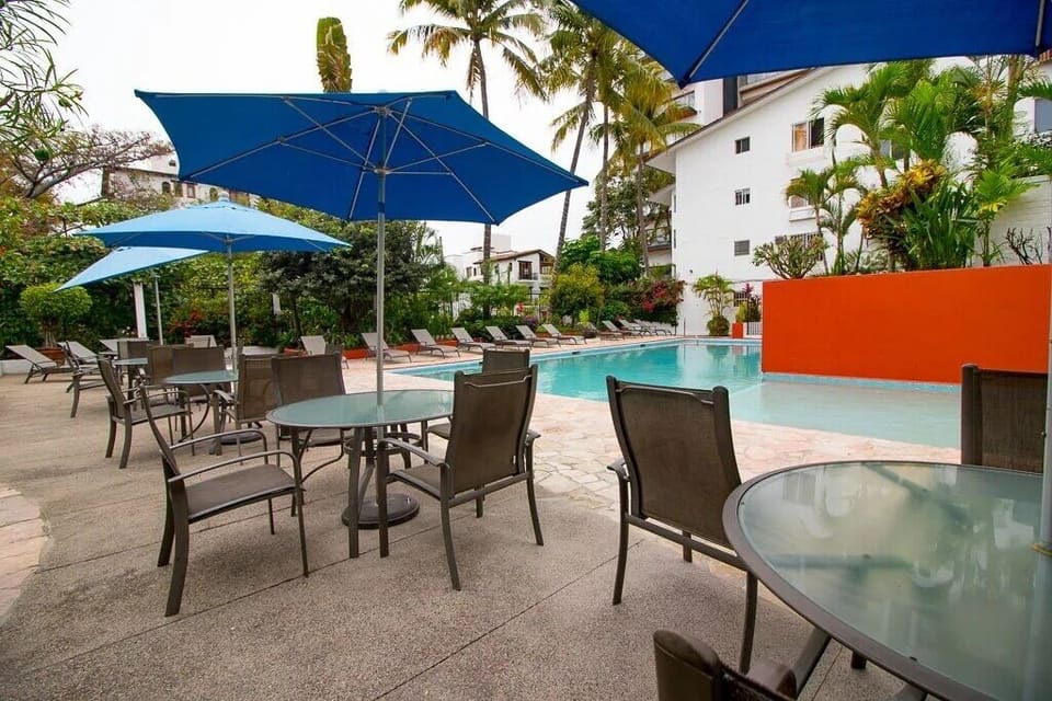 Comfort Condo | Living area | 33-inch TV with cable channels