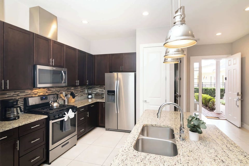 Townhome, Multiple Beds, Patio (Sunrise in Kissimmee) | Private kitchen | Coffee/tea maker, fridge, microwave, oven